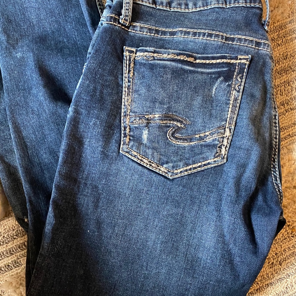 Silver distressed boyfriend skinny jeans